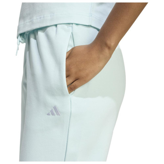 Adidas Γυναικείο παντελόνι φόρμας Essentials Small Logo Fellcozy Open-Hem Pants Adidas Γυναικείο παντελόνι φόρμας Essentials Small Logo Fellcozy Open-Hem Pants